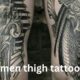 men thigh tattoo